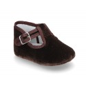 Velvet canvas T-Strap shoes for babies with hook and loop strap.