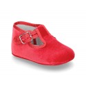 Velvet canvas T-Strap shoes for babies with hook and loop strap.