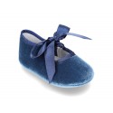 Velvet little Mary Janes for babies with ties closure.