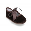 Velvet little Mary Janes for babies with ties closure.