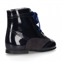Combined Pascuala style boots in suede and patent leather.