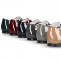 Classic little Mary Janes with chopped design in patent leather.