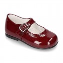 Classic little Mary Janes with chopped design in patent leather.