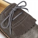 Combined leather Laces up shoes with fringed design.