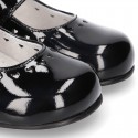 Classic BLACK patent leather little Mary Janes with perforated heart design.