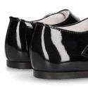 Classic BLACK patent leather little Mary Janes with perforated heart design.