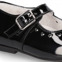 Classic BLACK patent leather little Mary Janes with perforated heart design.