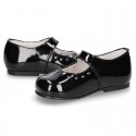 Classic BLACK patent leather little Mary Janes with perforated heart design.