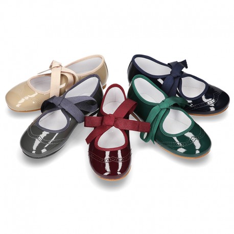 Patent leather Angle style ballet flat or Mary Jane shoes.