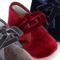 Velvet canvas Bootie shoes for babies with ties closure.