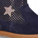 Botita con cremallera y ESTRELLAS en serratex.