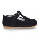 Classic Suede leather T-strap shoes with scallop and buckle fastening.