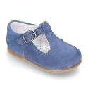 Classic Suede leather T-strap shoes with scallop and buckle fastening.