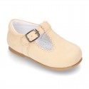 Classic Suede leather T-strap shoes with scallop and buckle fastening.