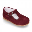 Classic Suede leather T-strap shoes with scallop and buckle fastening.