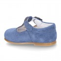 Classic Suede leather T-strap shoes with scallop and buckle fastening.