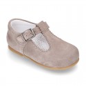 Classic Suede leather T-strap shoes with scallop and buckle fastening.