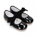 New Little Mary Janes angle style in BLACK patent leather with velvet ties.