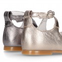New Metal leather little Mary Janes with crossed straps.