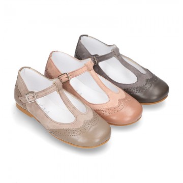 New T-strap little Mary Janes combined in soft suede leather with soft nappa leather.