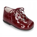 Patent leather little kids English style shoes in autumn colors.