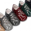 Patent leather little kids English style shoes in autumn colors.