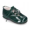 Patent leather little kids English style shoes in autumn colors.