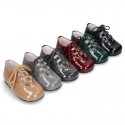 Patent leather little kids English style shoes in autumn colors.