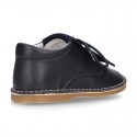 Little Classic Oxford style shoes with fringed design and flexible soles in combined leather.