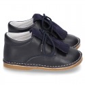 Little Classic Oxford style shoes with fringed design and flexible soles in combined leather.