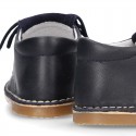 Little Classic Oxford style shoes with fringed design and flexible soles in combined leather.