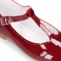 Little T strap Mary Jane shoes in patent leather.