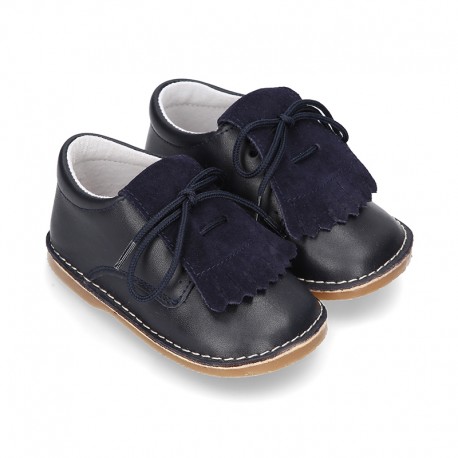 Little Classic Oxford style shoes with fringed design and flexible soles in combined leather.