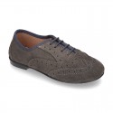 Classic Oxford laces up shoes in suede leather with ties closure.