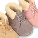 New Little desert boots for babies with fake hair lining and non slip sole in Suede leather.
