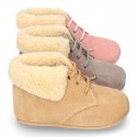 New Little desert boots for babies with fake hair lining and non slip sole in Suede leather.