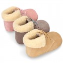 New Little desert boots for babies with fake hair lining and non slip sole in Suede leather.