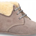 New Little desert boots for babies with fake hair lining and non slip sole in Suede leather.