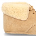 New Little desert boots for babies with fake hair lining and non slip sole in Suede leather.