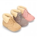New Little desert boots for babies with fake hair lining and non slip sole in Suede leather.