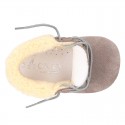 New Little desert boots for babies with fake hair lining and non slip sole in Suede leather.