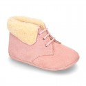 New Little desert boots for babies with fake hair lining and non slip sole in Suede leather.