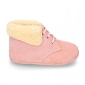 New Little desert boots for babies with fake hair lining and non slip sole in Suede leather.