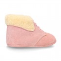 New Little desert boots for babies with fake hair lining and non slip sole in Suede leather.