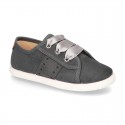 New serratex canvas FASHION tennis shoes with ties closure and chopped design.