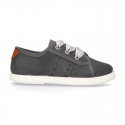 New serratex canvas FASHION tennis shoes with ties closure and chopped design.