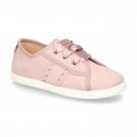 New serratex canvas FASHION tennis shoes with ties closure and chopped design.