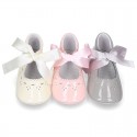 Little Mary Jane shoes angel style with ties in patent leather for baby.