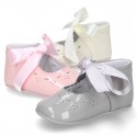 Little Mary Jane shoes angel style with ties in patent leather for baby.