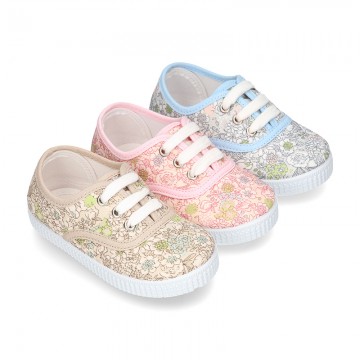 Cotton canvas Bamba type shoes with shoelaces and FLOWERS print design.